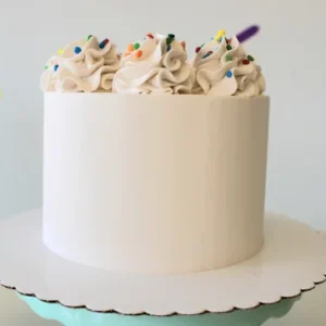 White cake with colorful sprinkles