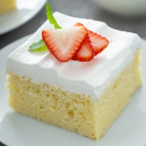 Dessert with whipped cream and strawberry slices